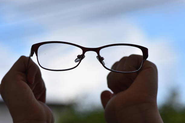 istock Girl holding glasses 1124656031