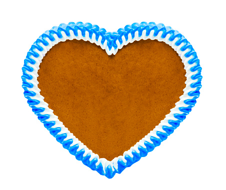 Gingerbread cookie. \nHeart shape. \nIsolated on white.