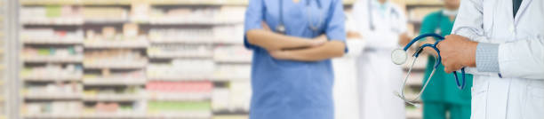 istock Doctor working in hospital with other doctors. 1124658761