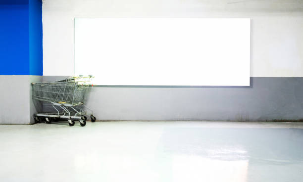 Blank billboard on the wall of supermarket.