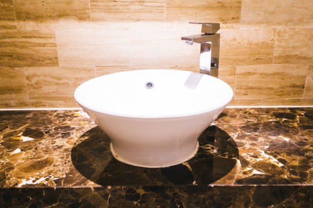 istock White sink and faucet decoration in bathroom 1124665485