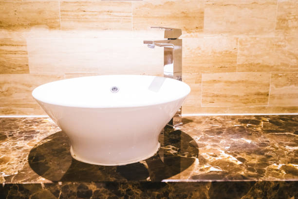 istock White sink and faucet decoration in bathroom 1124665570