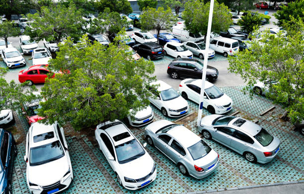istock Cars in parking garage background 1124667180
