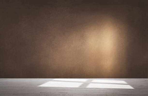 istock Brown wall in an empty room with concrete floor 1124667254