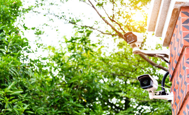 Security camera on the wall of residential building