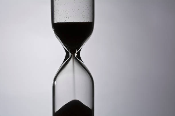 istock Silhouette of the sand clock 1124668292