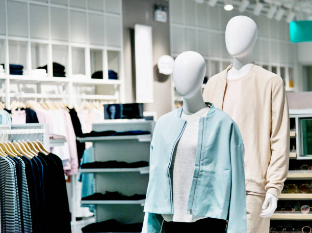 istock Mannequins in modern clothing store 1124669439