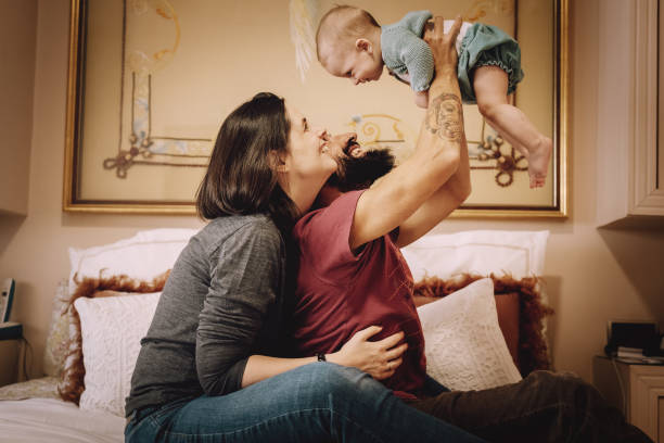 istock Family playing in bed 1124672754