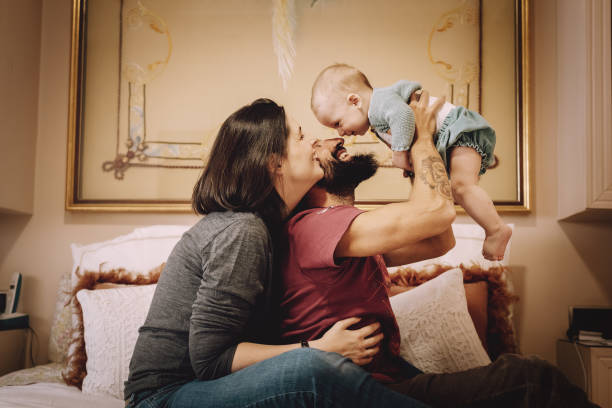 istock Family playing in bed 1124672756