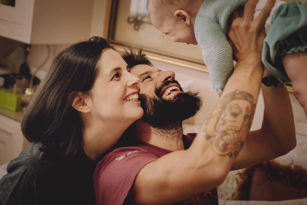 istock Family playing in bed 1124672798