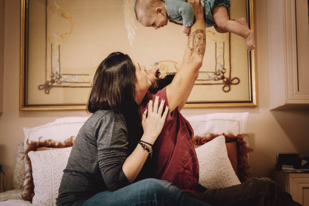 istock Family playing in bed 1124672806