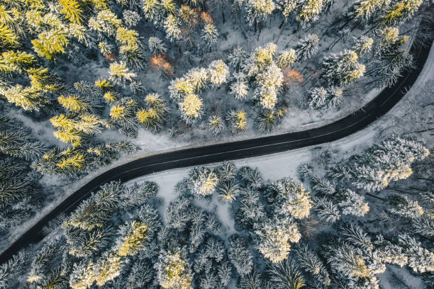 istock Top down view of a road after a heavy snowfall 1124676789