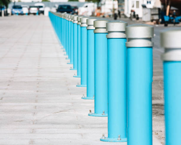 istock Abstract blue metal poles in a row 1124678722