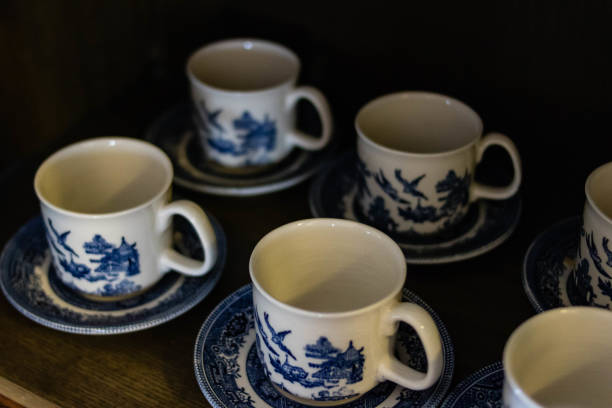istock English tea cups on wooden floor. 1124678881