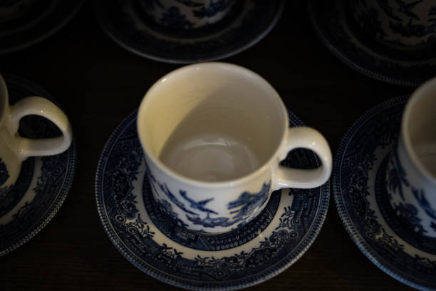 istock English tea cups on wooden floor. 1124678915