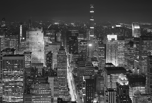 Black and white aerial view of New York City at a hazy night, USA.