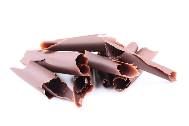 istock Chocolate shavings isolated on white background 1124683347