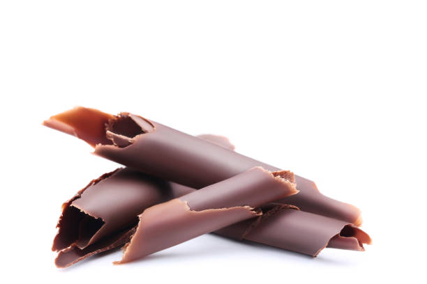 istock Chocolate shavings isolated on white background 1124683364