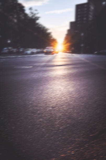 istock Blurred street at sunset. 1124683387