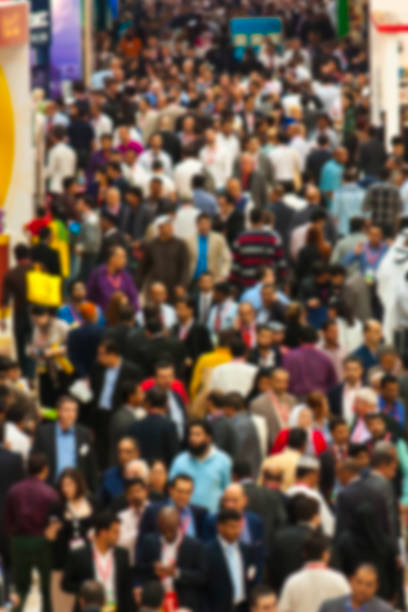 istock Defocused people walking on street 1124684282