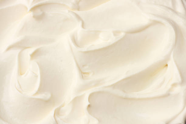 istock sour cream background. sour cream texture. top view 1124686035