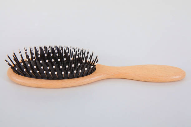 istock Wood hair brush isolated on white background. 1124688461