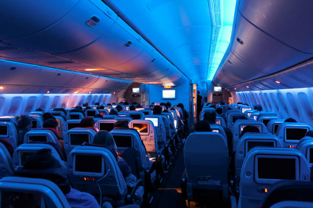 inside of an airplane - airplane seat imagens e fotografias de stock