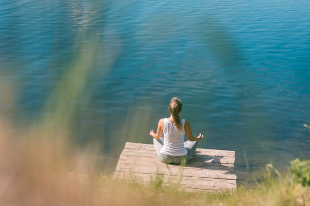 istock Meditation at the water 1124688504