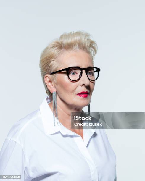 Portrait Of Elegant Senior Woman Stock Photo - Download Image Now - Anxiety, Elegance, Eyeglasses