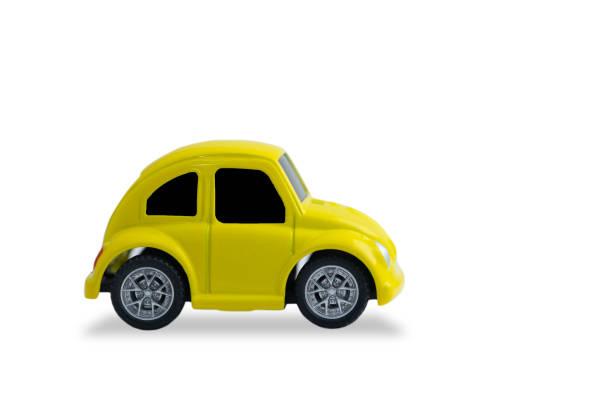 istock small yellow metal car isolated on white background 1124695641