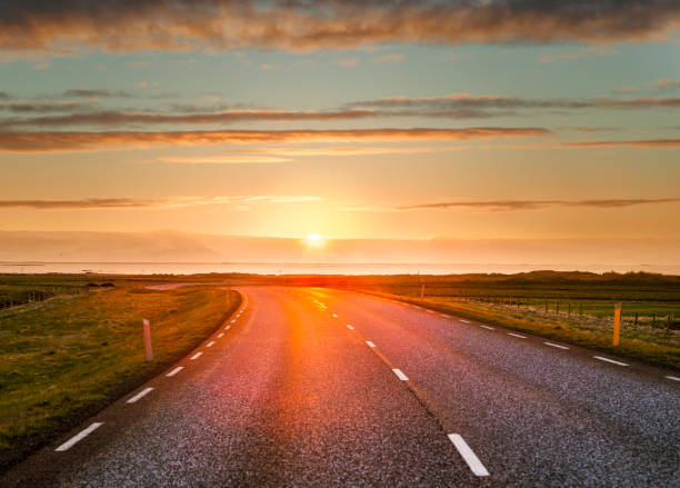 istock Beautiful view of sunset over an empty road 1124697186