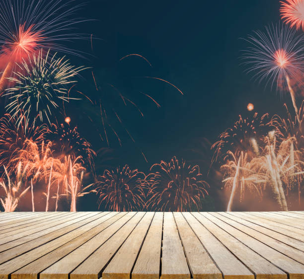 istock fireworks background for celebration design with wooden table top for advertise 1124697252