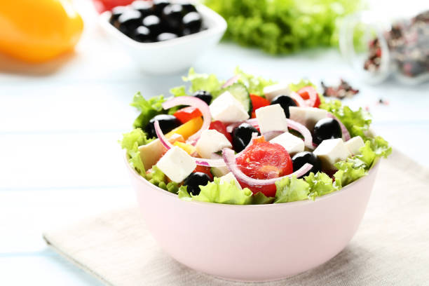 istock Vegetable salad in bowl with napkin 1124697275