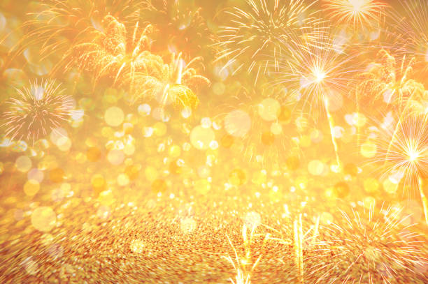 istock fireworks; firework;new; year; celebration;table,top,desk, wooden,happy; abstract;  background; holiday; party; event; colorful; anniversary; night; celebrate; gold; light; festive; festival; fire; bokeh; eve; christmas; color; bright; golden; explosion; 1124697554