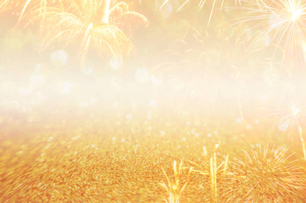 istock abstract golden sparkling and fireworks background with space for text 1124697562