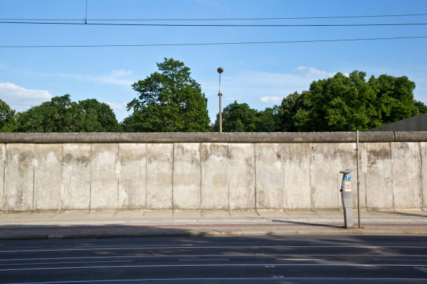 Berlin, Germany  - May 21, 2017: The Berlin Wall Memorial on the Bernauer Strasse in Central Berlin is a national and international landmark.  During the Cold War the concrete wall divided the city in east and west.