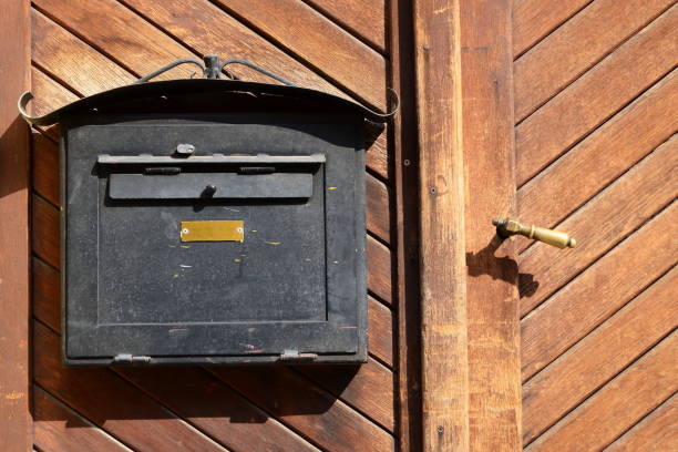 istock Mailbox on wooden door 1124699701