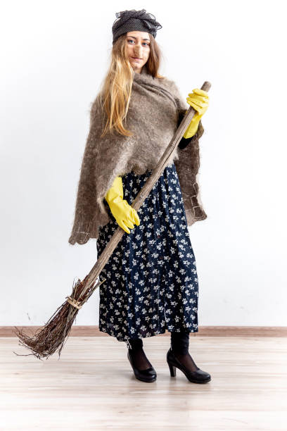 istock A young woman wearing a witch costume 1124704612