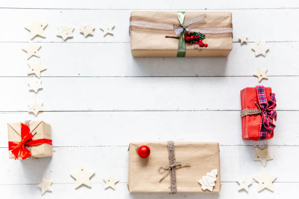istock Christmas presents and boxes on wooden background 1124708962