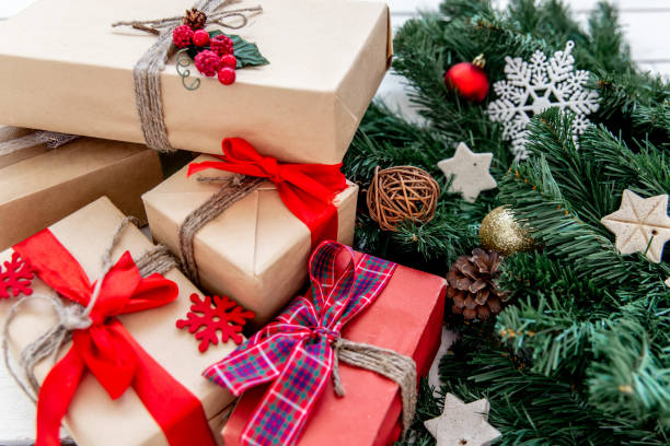 istock Christmas presents and boxes on wooden background 1124709136