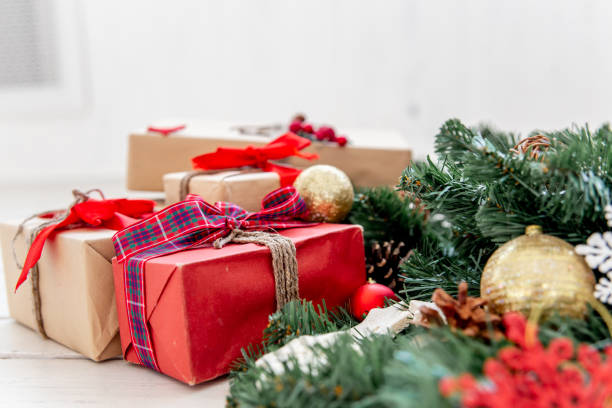 istock Christmas presents and boxes on wooden background 1124709424