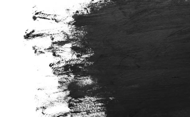 istock Black paint brush strokes texture isolated on white background. 1124709522