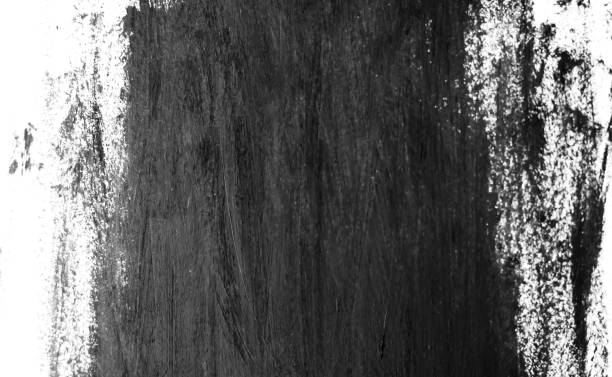 istock Black paint brush strokes texture isolated on white background. 1124709545