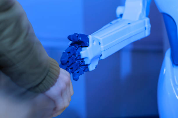 istock Man stretches his hand on the stylish handsome cyborg hand, Robot and Engineerer human, toned 1124710008