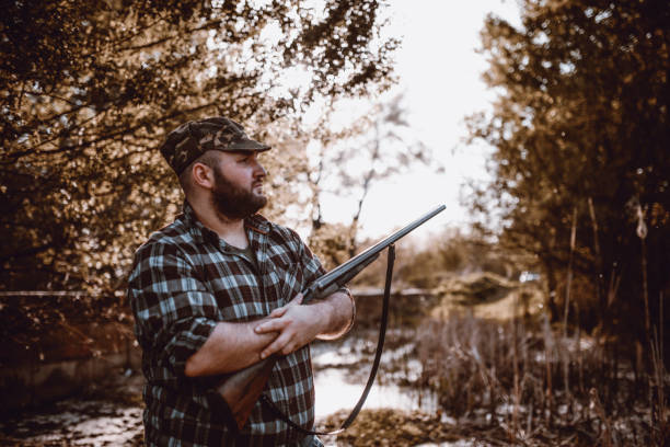 istock Mature Male Hunter Waiting For Prey 1124713996