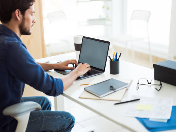istock Latin  man working on his laptop 1124714953
