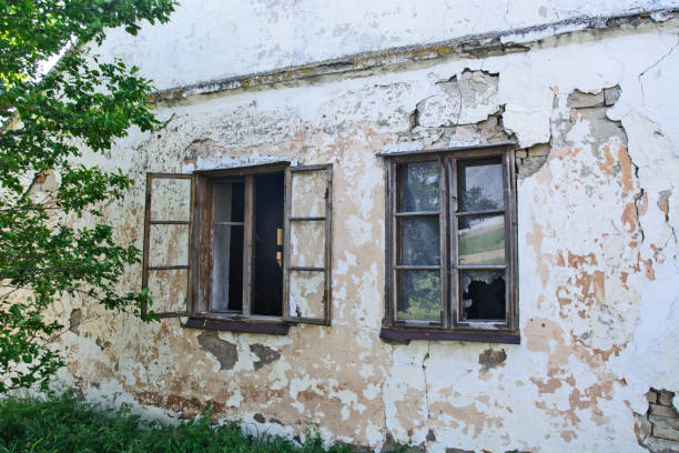 istock Windows of old abandoned house 1124715417