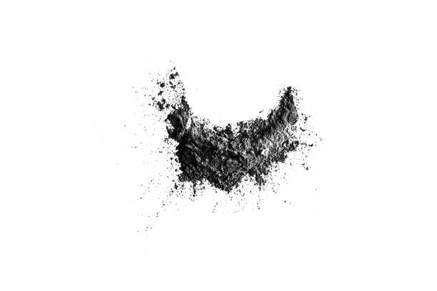 istock Black cosmetic clay isolated on white background, 1124715485