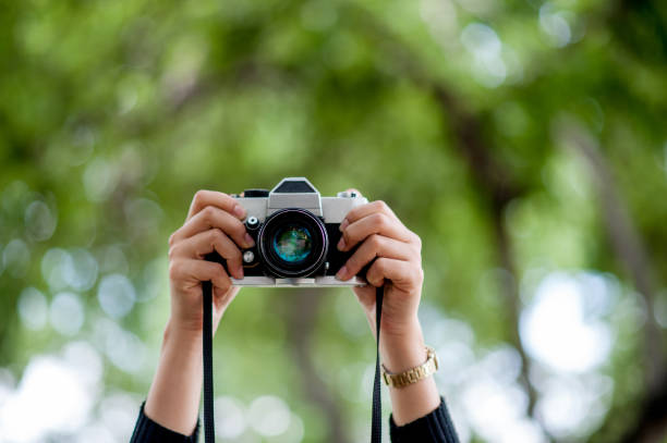 istock Hand and camera shots Photography concept With copy space 1124717064