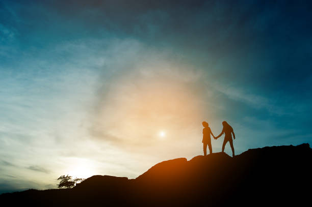 istock Silhouette of team leadership, teamwork and teamwork and delightful silhouette concepts 1124717314